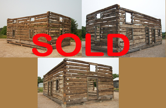 Double Pen log cabin with log center  Double Pen Cabin with log center wall.