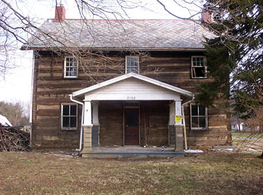 Huge Zanesville Ohio log house full two story with ten foot ceilings.